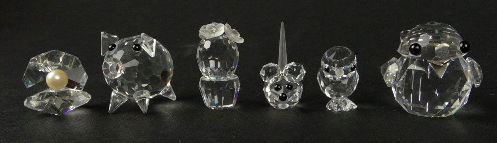 Lot of 5 Miniature Swarovski Figurines. Includes Bird,: Lot of 5 Miniature Swarovski Figurines. Includes Bird, Pig, Flowers, Chick, Clam Shell. All Signed. NO BOXES. Most with Tiny Chips. PLEASE NOTE, THE MOUSE PICTURED IS NOT INCLUDED. Measures 3/4 Inch a