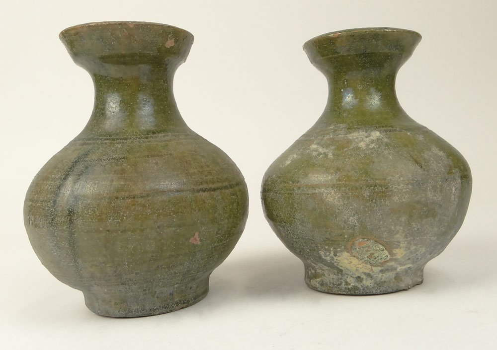 Two (2) Chinese Han Dynasty (206 BCâ€“220 AD) Green: Two (2) Chinese Han Dynasty (206 BCâ€“220 AD) Green Glazed Hu Vases. Unsigned. Firing Pops, Chips or in Otherwise Good Antique Condition. Measures 5-1/2 Inches Tall and 4-1/2 Inches Diameter. The