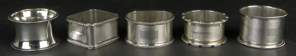 Lot of Five (5) English Sterling Silver Napkin Rings.: Lot of Five (5) English Sterling Silver Napkin Rings. All Hallmarked, Birmingham with Various Dates: 1905,1952, 1953, 1957 (2). Good Condition. Sizes Ranging from 1 Inch to 1-1/4 Inches. Shipping $38.