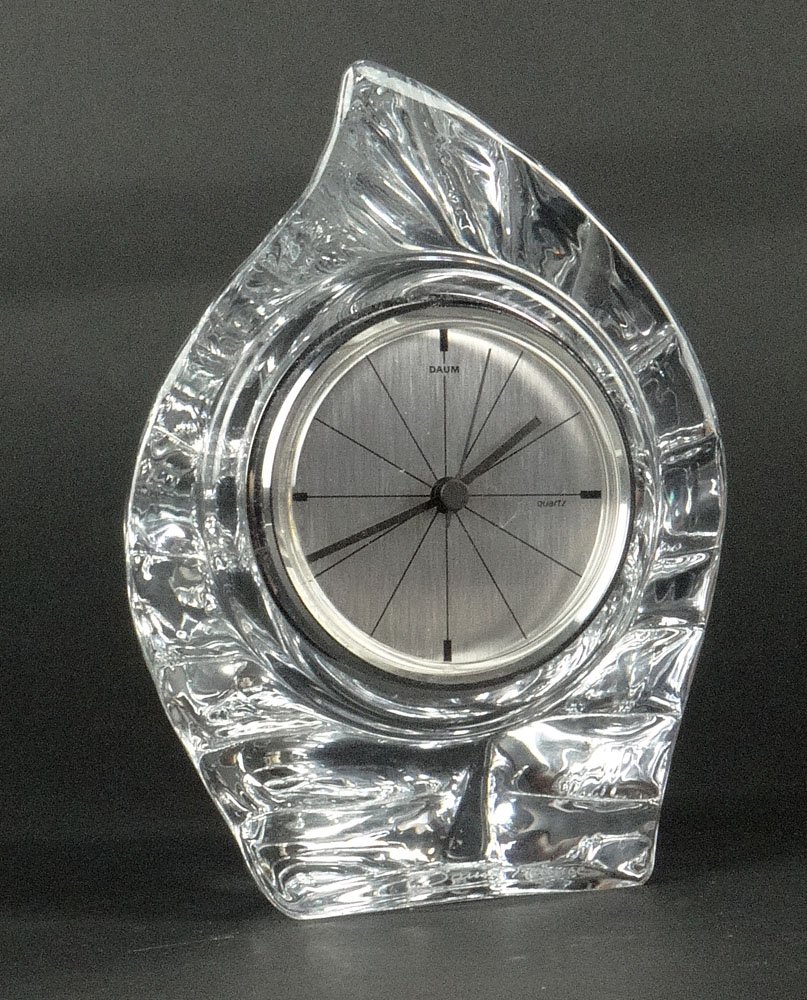 Daum Crystal Flame Clock. Signed Daum France. Small: Daum Crystal Flame Clock. Signed Daum France. Small Chip on Tip or in otherwise Good Condition. Measures 6-1/4 Inches Tall, 4-3/4 Inches Wide. Shipping $43.00
