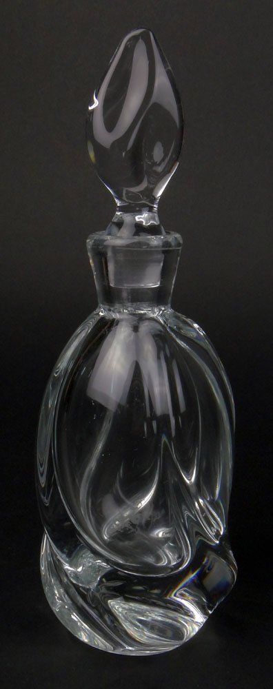 Modern Daum Crystal Perfume Bottle With Swirl Design: Modern Daum Crystal Perfume Bottle With Swirl Design and Flame Stopper. Signed Daum Frame and AV on bottom. Good Condition. Measures 8 Inches Tall. Shipping $43.00