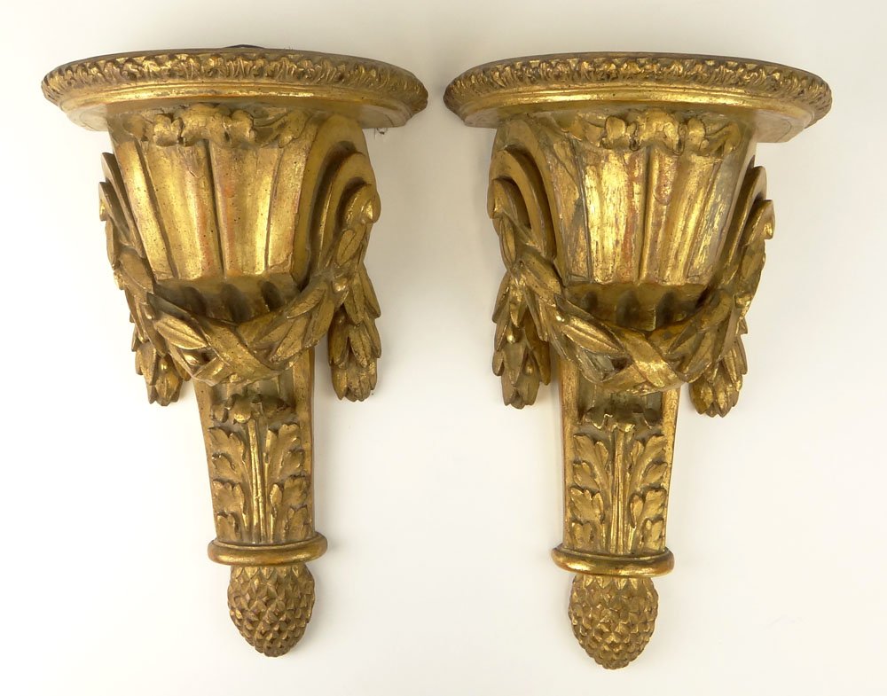 Pair of Vintage Neoclassical style Gilt Cast Plaster: Pair of Vintage Neoclassical style Gilt Cast Plaster Wall Brackets. Unsigned. Good Condition. Measure 16-1/2 Inches Tall and 10-1/4 Inches Wide. Shipping $125.00