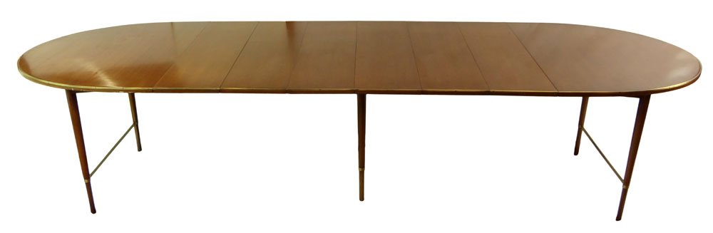 Paul McCobb, American Circa 1950's Walnut and Brass: Paul McCobb, American Circa 1950's Walnut and Brass Extension Dining Table for Calvin. Signed. Surface Wear from Normal Use Otherwise Good Condition. Measures 30 Inches tall, 62 Inches Long and 39 Inc