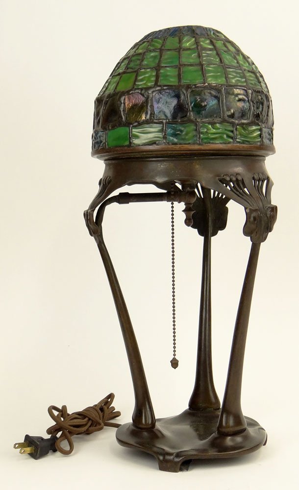 Modern Tiffany style Leaded Glass and Patinated Bronze: Modern Tiffany style Leaded Glass and Patinated Bronze Turtleback and Geometric Tile Table Lamp. Unsigned. Spliced Cord Otherwise Good Condition or Better. Measures 18-3/8 Inches Tall and 8-1/2 Inches