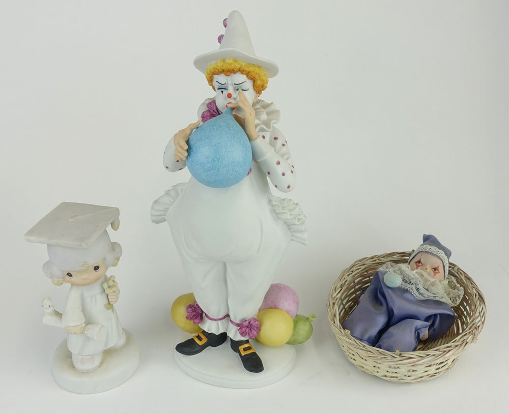 Royal Doulton's Carnival of Clowns "Breathtaking: Royal Doulton's Carnival of Clowns "Breathtaking Performance" Figurine Together with Precious Moment Graduation Figurine and Miniature Handmade and Hand Painted Porcelain Clown in Basket. Makers Mark