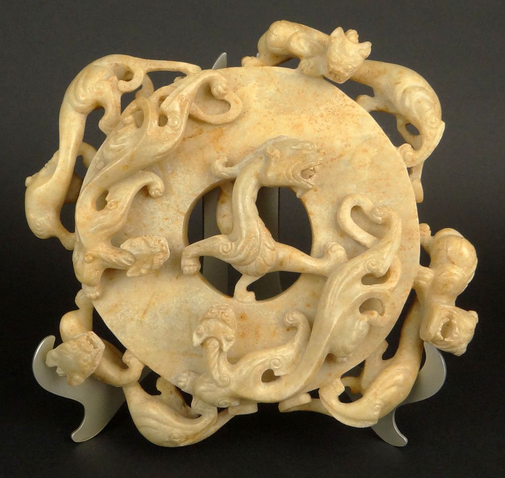 Chinese Carved Soapstone Bi Disc with Relief Carved: Chinese Carved Soapstone Bi Disc with Relief Carved Chilongs. Unsigned. Good Condition or Better. Measures 9 Inches Tall and 10 Inches Wide. Shipping $48.00