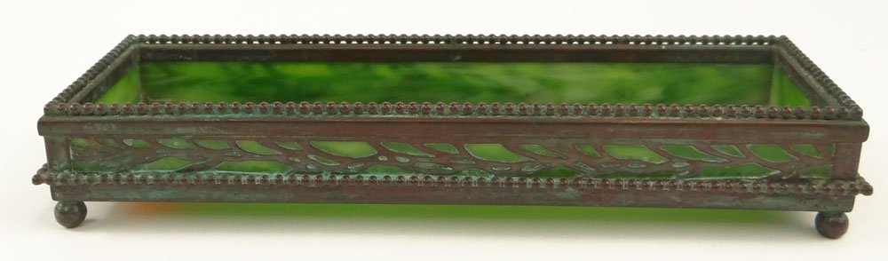 Tiffany Studios Bronze and Green Slag Glass Pen Tray.: Tiffany Studios Bronze and Green Slag Glass Pen Tray. Signed Tiffany Studios New York. Monogrammed E.M.R. Good Condition. Measures 8-1/4 Inches by 2-3/4 Inches. Shipping $54.00