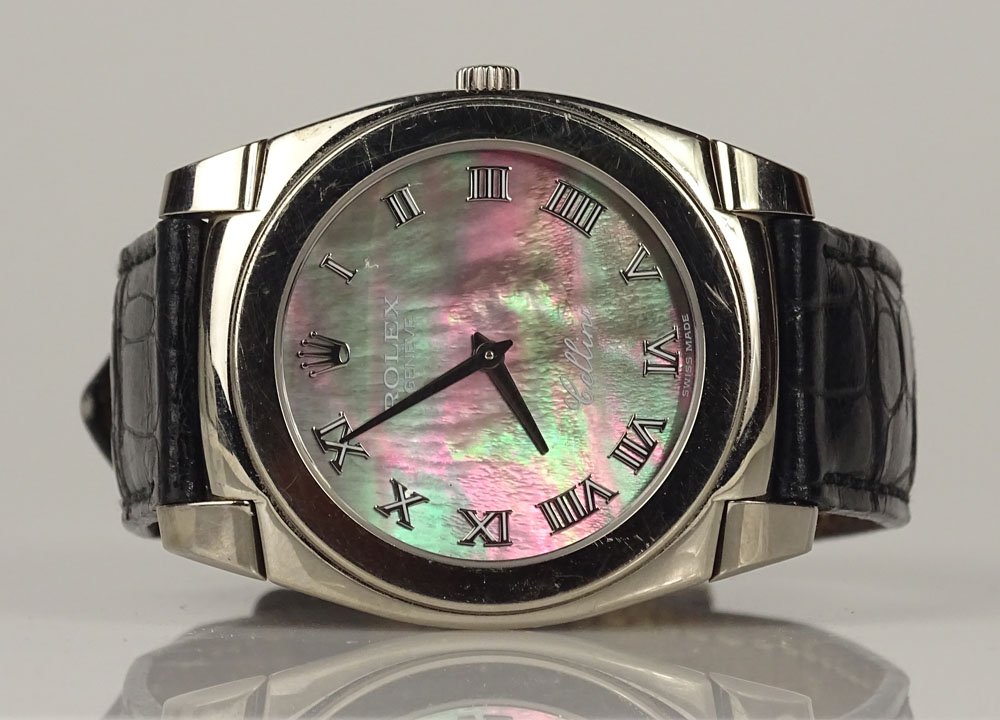 Man's Circa 2005 Rolex Cellini 18 Karat White Gold: Man's Circa 2005 Rolex Cellini 18 Karat White Gold Watch with Mother of Pearl Face and Crocodile Strap. Signed 18K to Case and Buckle. Minor Surface Wear from Normal use Otherwise Good Condition with 