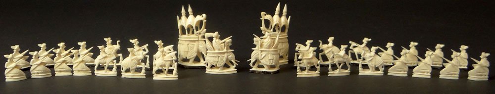 Vintage Indian Carved Ivory Chess Set with Fitted Box.: Vintage Indian Carved Ivory Chess Set with Fitted Box. Small Paper Tag "Made in India". Appears to be Unused, Very Good Condition. Largest Piece Measures 2-1/4 Inches Tall and 1-1/4 Inches Wide. Shipp