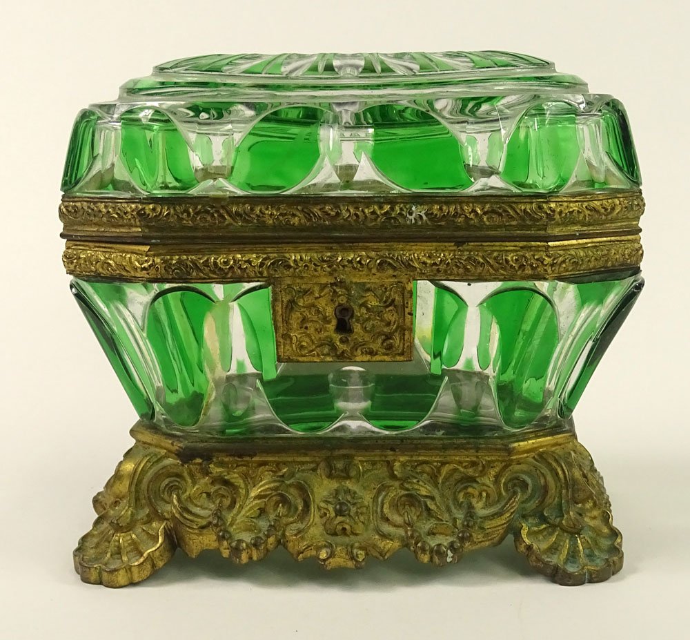 19th Century Bronze Mounted Clear to Green Glass Vanity: 19th Century Bronze Mounted Clear to Green Glass Vanity Box. Rococo Style Mounts. No Key. Unsigned. The Lock is not Flush with the glass or in Good Condition. Measures 5-1/2 Inches Tall, 6 Inches Wide