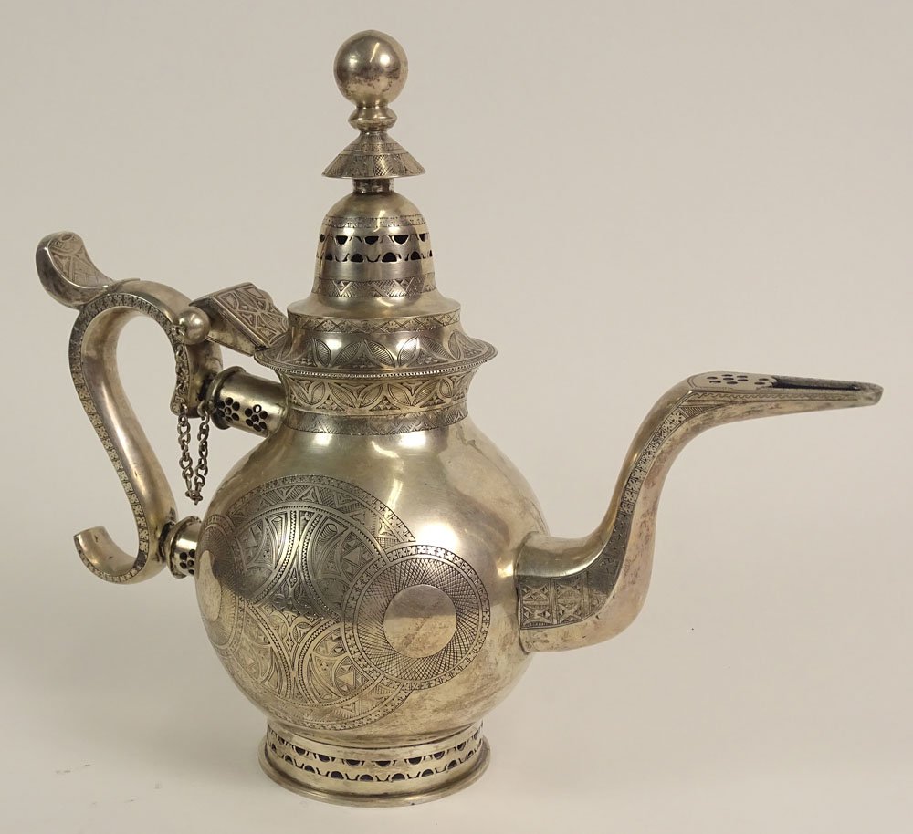 19th Century or Earlier Middle Eastern Probably Turkish: 19th Century or Earlier Middle Eastern Probably Turkish Engraved Silver Tea Pot. Unsigned. Tests as Low Grade Silver. Good Condition or Better. Measures 12 Inches Tall and 14-1/2 Inches Wide. Approx W