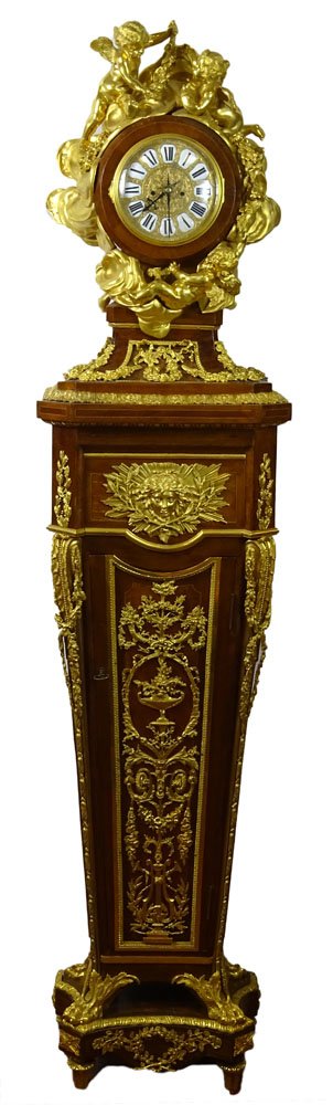 Fabulous Louis XVI Style ormolu-mounted Kingwood: Fabulous Louis XVI Style ormolu-mounted Kingwood Parquet Pedestal "RÃ©gulateur de Parquet" Clock in the Style of Jean-Henri Riesener. Unsigned. Good Condition. Measures 86 Inches Tall, 20 Inches Wid