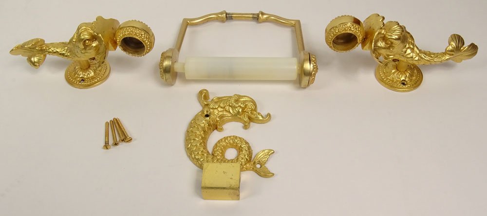 Three (3) Piece Sherle Wagner Gilt Bronze Figural: Three (3) Piece Sherle Wagner Gilt Bronze Figural Bathroom Hardware Set. Classic Dolphin Motif. Set Includes Opposing Towel Bar Holders 6 Inches Length, 3 Inches Deep. A Toilet Roll Holder, 9 Inches L