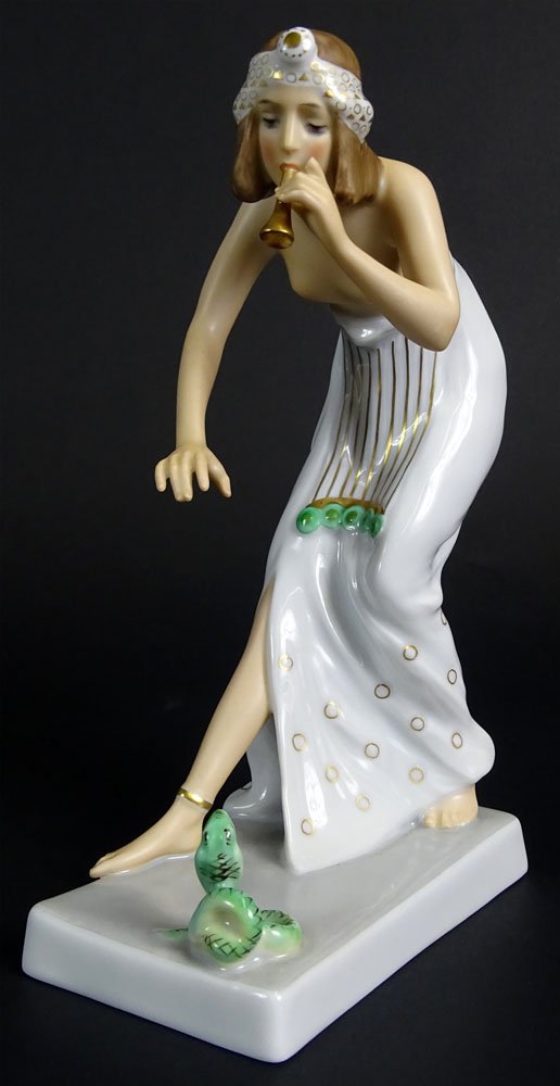 Circa 1920 Rosenthal Painted and Gilt Porcelain Figure: Circa 1920 Rosenthal Painted and Gilt Porcelain Figure "Snake Charmer". Signed Rosenthal (logo), artist signature and impressed H.442. to base. Good Condition or Better. Measures 7-3/4 Inches Tall and
