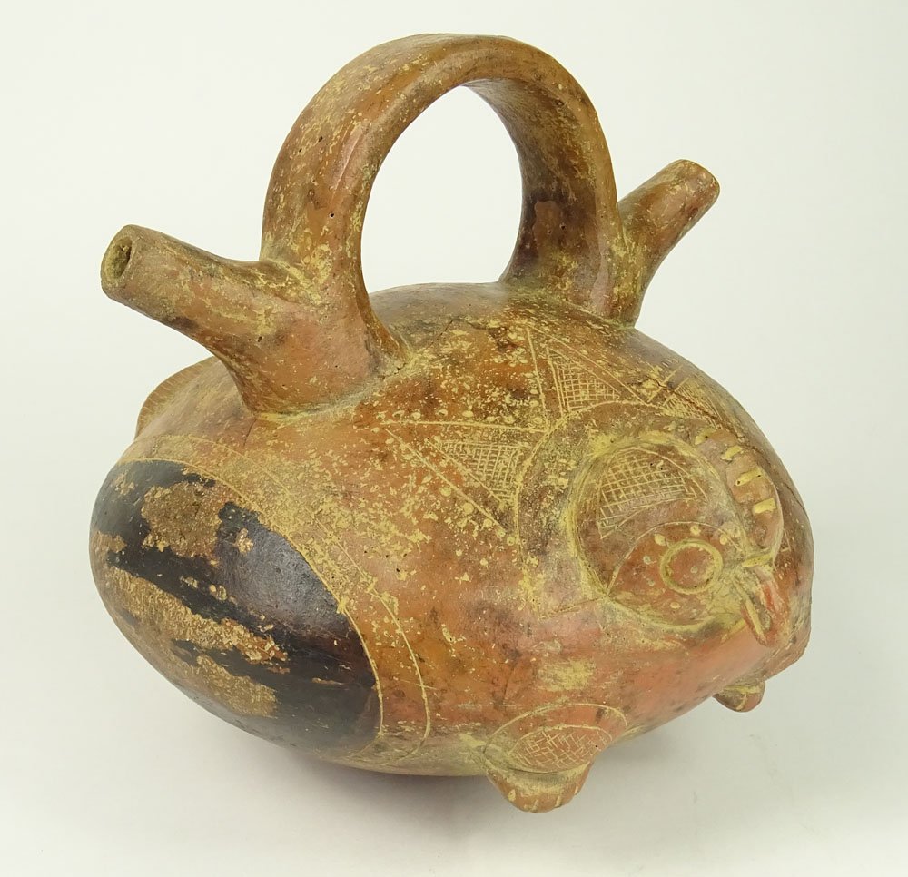 Pre-Colombian "Alcarraza" Calima Terracotta Vessel.: Pre-Colombian "Alcarraza" Calima Terracotta Vessel. Depicting a Chicken Form. Loop Handle with Opposing Spouts. Crack, wear. Measures 7 Inches Tall, 8 Inches Length. Very Fragile. Shipping $65.00