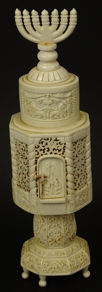 Antique Judaica Reticulated Carved Ivory Menorah.: Antique Judaica Reticulated Carved Ivory Menorah. Carved Hebrew Signature on Bottom. One Foot Missing or in Good Condition. Measures 11 Inches Tall. Proceeds of the sale of this item to benefit the Le
