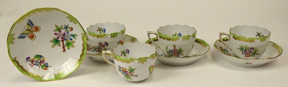Four (4) Herend Hand Painted Queen Victoria Cups and: Four (4) Herend Hand Painted Queen Victoria Cups and Saucer Sets. Signed With Blue Herend Backstamp, 711/VBO. Good Condition. Cups Measure 1-3/4 Inches, Saucers, 4-5/8 Inches. Proceeds of the sale of 