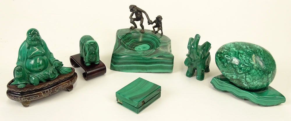 Lot of Six (6) Malachite Objects. This Lot includes:: Lot of Six (6) Malachite Objects. This Lot includes: Carved Seated Buddha Figure on Hardwood Stand, 3-1/2 Inches Tall; Carved Pin Tray with Metal Monkey Figures, 3 Inches Tall; Large Carved Egg on Bas