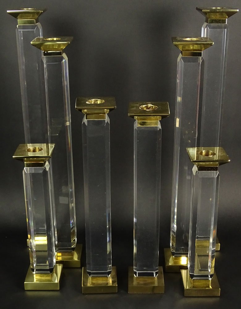 Charles Hollis Jones Eight (8) Piece Suite of Pedestal: Charles Hollis Jones Eight (8) Piece Suite of Pedestal Style, Beveled Lucite and Brass Candlesticks. Circa 1975. Unsigned. Good Condition. Graduated Pairs Measure 22 Inches, 20 Inches, 15-1/2 Inches, 