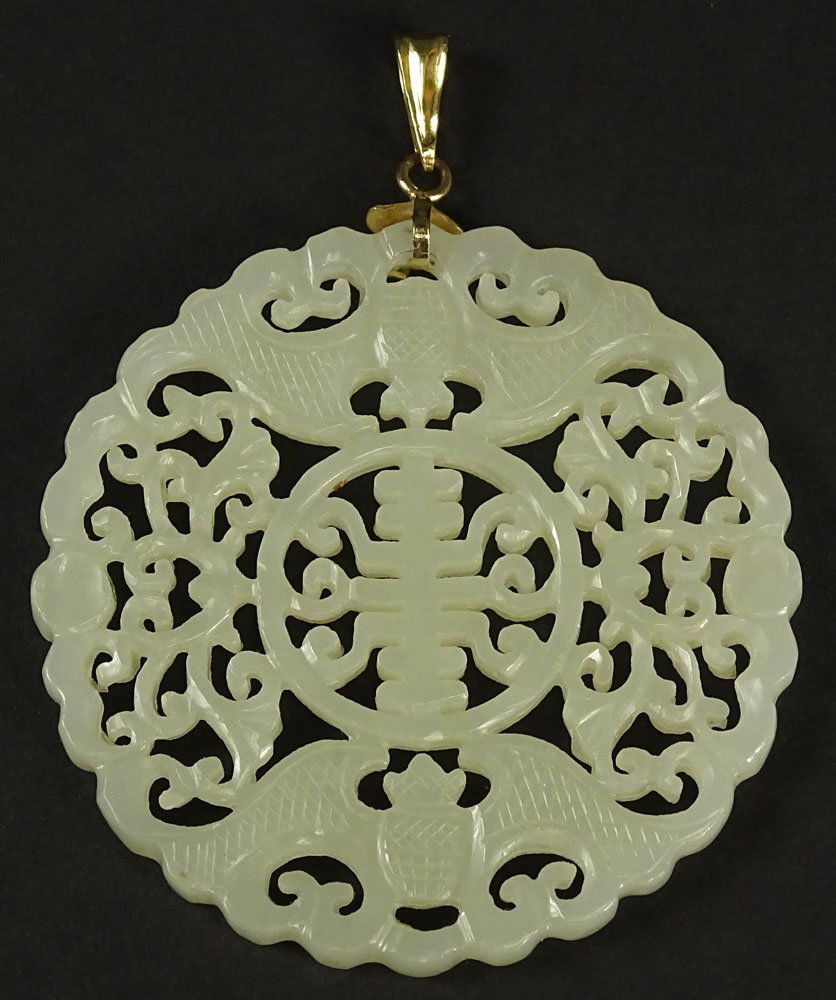 Chinese Openwork Carved White Jade and 14 Karat Yellow: Chinese Openwork Carved White Jade and 14 Karat Yellow Gold Pendant with Longevity Symbol and Bats. Bale Marked 14K. Good Condition or Better. Measures 2 Inches Diameter. Shipping $34.00