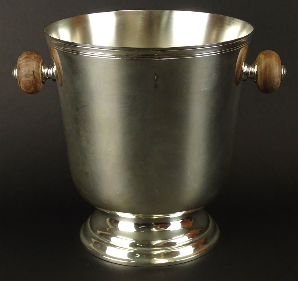 Christofle Silver Plate Ice Bucket. Wood Handles.: Christofle Silver Plate Ice Bucket. Wood Handles. Signed Christofle. Good Condition. Measures 9 Inches Tall, 8-1/2 Inches Diameter. Shipping $85.00