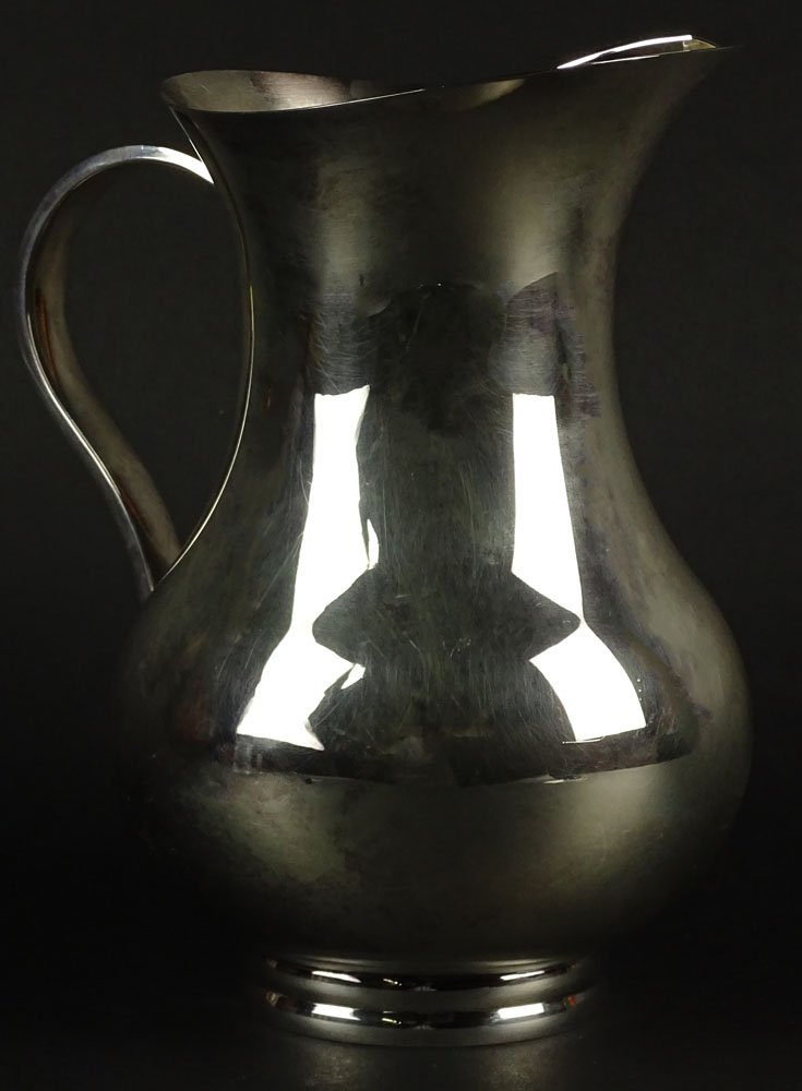 Christofle Silver Plate Water Pitcher. Signed: Christofle Silver Plate Water Pitcher. Signed Christofle. Good Condition. Original Anti-Tarnish Bag Included. Measures 8 Inches Tall. Shipping $65.00