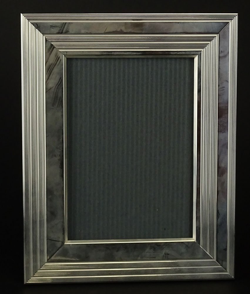 Christofle Silver Plate "Parsifal" Picture Frame in: Christofle Silver Plate "Parsifal" Picture Frame in Original Box. Signed Christofle. Measures 7-1/2 Inches by 6 Inches. Holds a Photo 5 Inches by 3-1/2 Inches. Shipping $35.00