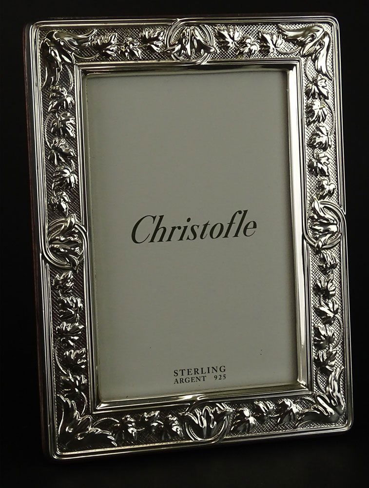 Christofle Sterling Silver Picture Frame. Vine and Leaf: Christofle Sterling Silver Picture Frame. Vine and Leaf Design. Signed Christofle Sterling. Good Condition. Includes Partial Original Box. Measures 7-3/4 Inches by 5-3/4 Inches. Opening 5-1/2 Inches b
