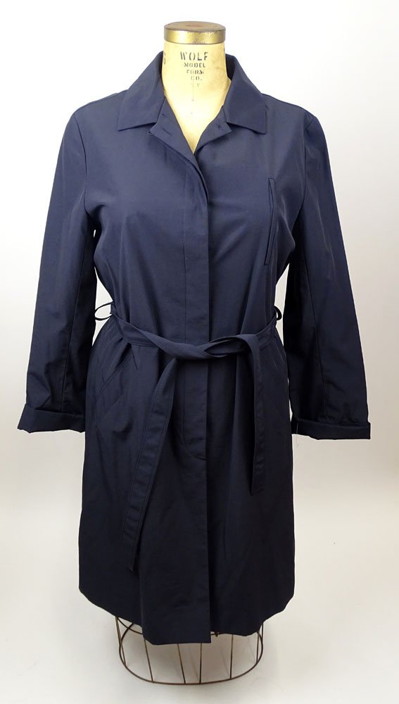 From a Palm Beach Socialite, A Dana Buchman Trench: From a Palm Beach Socialite, A Dana Buchman Trench Coat. Nylon and Cotton. Labeled. Size M. Good Condition. Shipping $65.00