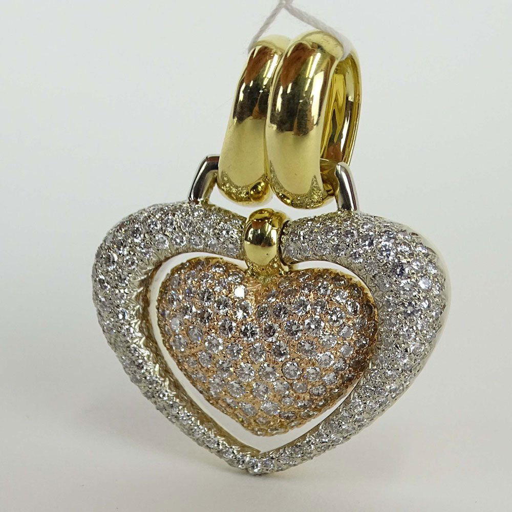 Italian Chimento Approx. 5.50 Carat Pave Set Round Cut: Italian Chimento Approx. 5.50 Carat Pave Set Round Cut Diamond and 18 Karat Yellow Gold Heart Pendant. Diamonds G-H color, VS clarity. Signed. Very good condition. Measures 1-3/4 inches long and 1-1/2