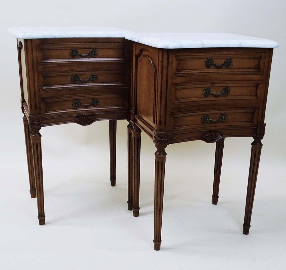 Pair of Mid 20th Century Louis XVI style Three Drawer: Pair of Mid 20th Century Louis XVI style Three Drawer Nightstands with Marble Tops. Unsigned. Surface wear from normal use otherwise good condition. Measure 27 inches tall, 16-1/4 inches wide and 12 i