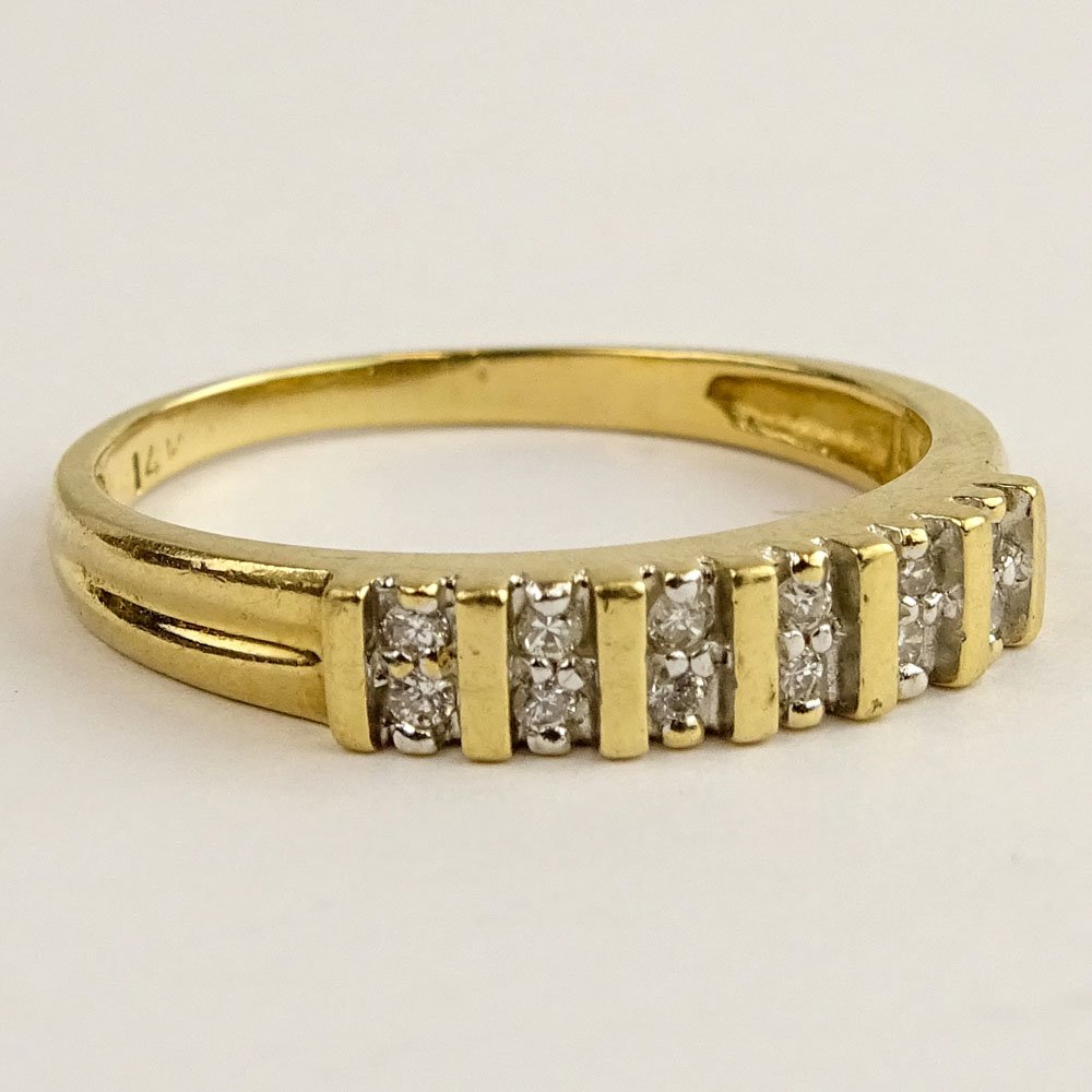 Lady's Delicate Diamond and 14 Karat Yellow Gold Ring. (1 of 8)