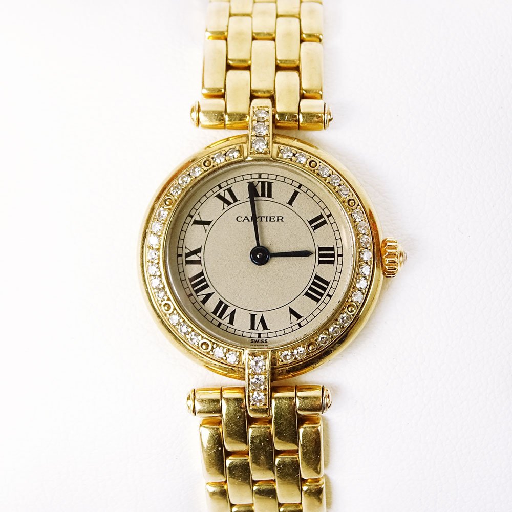 Lady's Cartier 18 Karat Yellow Gold Panthere Quartz: Lady's Cartier 18 Karat Yellow Gold Panthere Quartz Movement Watch with .80 Carat Round Cut Diamond Bezel. Serial # 866925 2050. Diamonds F color, VS1 clarity. Signed 18K. Minor surface wear from norm