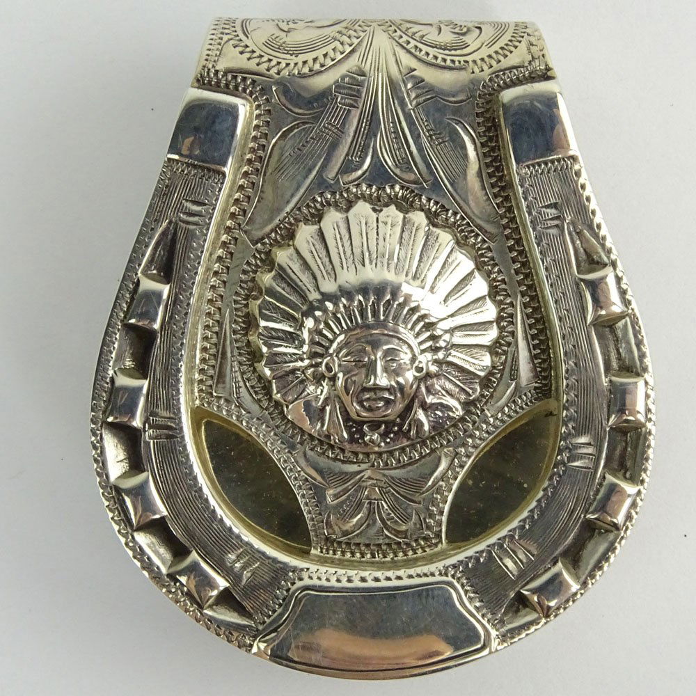 Vintage Edward Bohlin Sterling Silver Money Clip in: Vintage Edward Bohlin Sterling Silver Money Clip in Horseshoe and Indian Motif. Signed Edward H. Bohlin Hollywood CA. Sterling. Good condition. Measures 2" x 1-3/4" and weighs approx. 2.23 troy ounces
