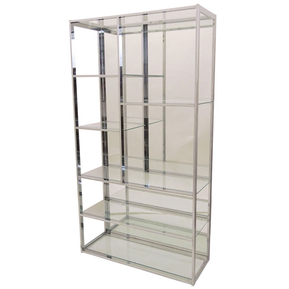 Milo Baughman, American (1923-2003) Chromed Steel and: Milo Baughman, American (1923-2003) Chromed Steel and Glass Etagere (added mirror back). Unsigned. Minor surface pitting otherwise good condition. Measures 78-1/4" H, 42" W, 16" D. Domestic Shipping T