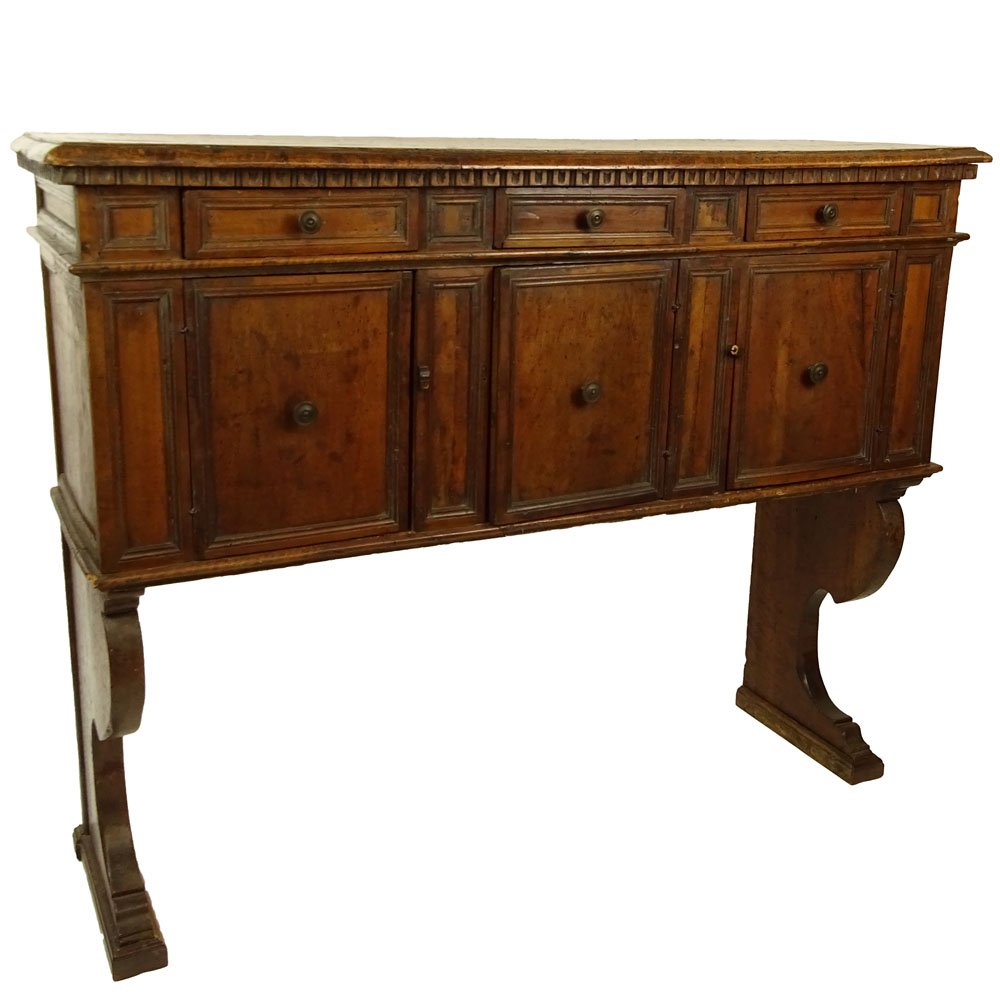 18th Century Italian Tuscan Walnut Credenza With Three: 18th Century Italian Tuscan Walnut Credenza With Three Drawers. Unsigned. Typical wear, rubbing, losses and scratches consistent with age. Measures 48-1/2" H x 61" L x 18-1/4" D. Provenance: Collectio