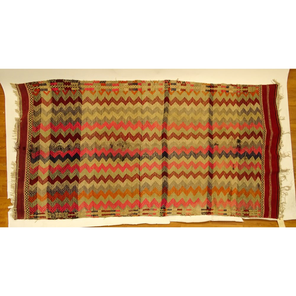 Vintage Moroccan Kilim Rug. Unsigned. Faded, wear,: Vintage Moroccan Kilim Rug. Unsigned. Faded, wear, stains, tears. AS IS condition. Measures 60" x 105". Provenance: Collection of Robert Eigelberger, Casa Phippsberger, a prominent Palm Beach, Florida