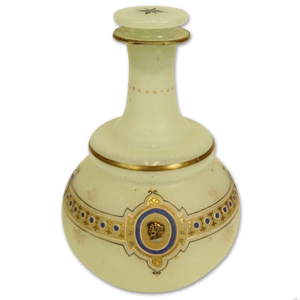 Antique Gilt and Enamel Decorated Opaline Glass Vanity: Antique Gilt and Enamel Decorated Opaline Glass Vanity Decanter. Unsigned. Rubbing to gilt decoration otherwise good antique condition. Measures 7-1/4" H, 4-1/2" W. Shipping $38.00 (estimate $100-$150