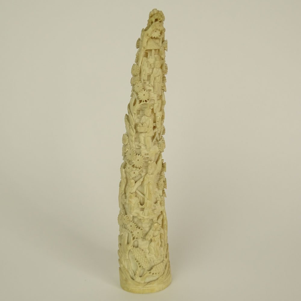 Antique Chinese Carved Ivory Tusk with Intricate Scene: Antique Chinese Carved Ivory Tusk with Intricate Scene with Figures. Unsigned. Good condition. Measures 10-1/4" H, 2" W at base. This item will only be shipped domestically and was legally imported in