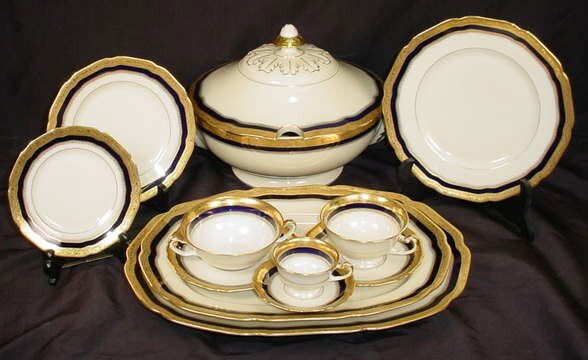Ninety-Nine (99) Piece Service for Twelve (12) Hut: Ninety-Nine (99) Piece Service for Twelve (12) Hutschenreuther Cobalt Blue and Gold Trim Dinner Service in the "5852" Pattern. Dinner Service Includes: 12 Dinner Plates Measuring 9-3/4 Inches Diameter