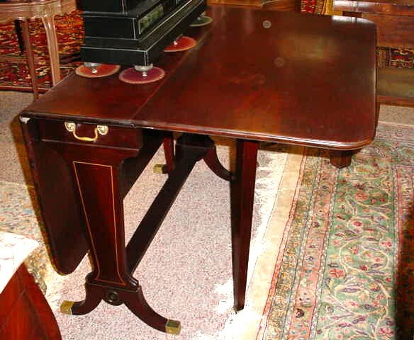 Brandt Mahogany Gateleg Drop Leaf Table. Signed. T: Brandt Mahogany Gateleg Drop Leaf Table. Signed. Top with Three (3) Deep Scratches or else Very Good Condition. Measures 29-1/2 Inches Tall and 39-7/8 Inches Wide, and Opened It Measures 55-1/2 Inches