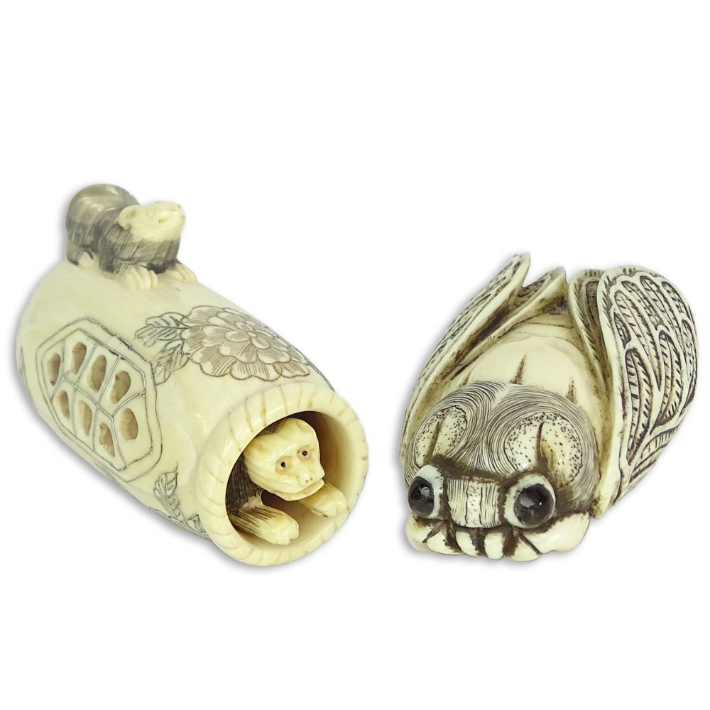 Two Carved Netsuke. One in the form of a (1 of 8)