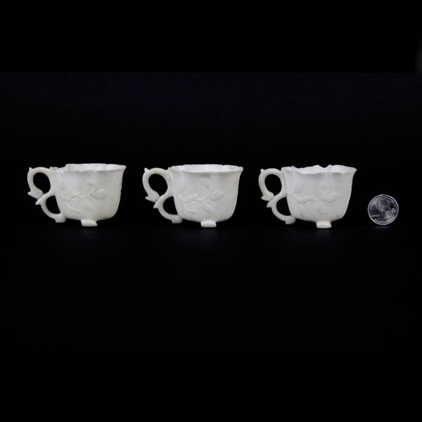 Set of Three (3) Antique Chinese Carved White Jade Tea: Set of Three (3) Antique Chinese Carved White Jade Tea Cups. Unsigned. Edge chips and losses. Measures 1-3/4" H. Provenance: Collection of Major General John A. Leide, US Army, Retired. Shipping $38.0