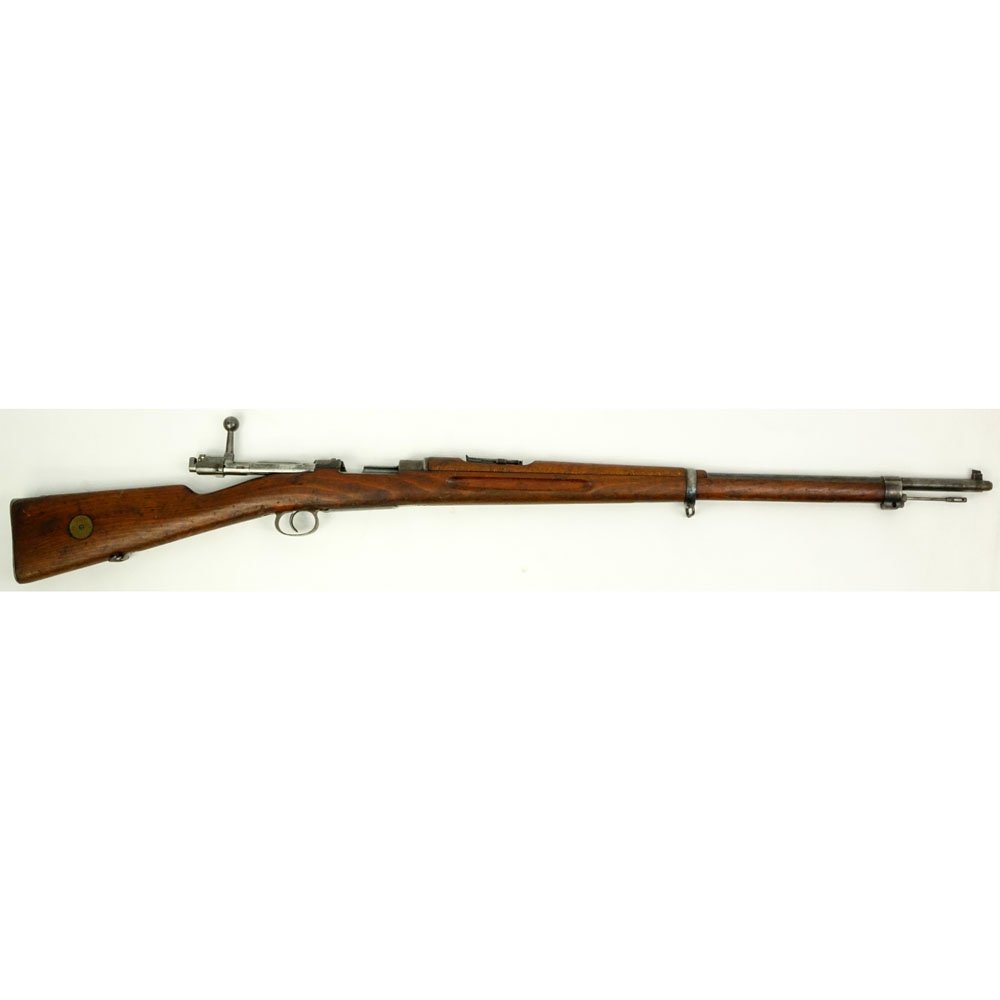 Antique Swedish Mauser M96 Carl Gustafs Stads: Antique Swedish Mauser M96 Carl Gustafs Stads Gevarsfaktori Rifle. Dated 1911. Serial number 289421. Mounted sight gauge, hooks for shoulder strap. Rubbing to wood, good condition. Measures 49-1/2" L.