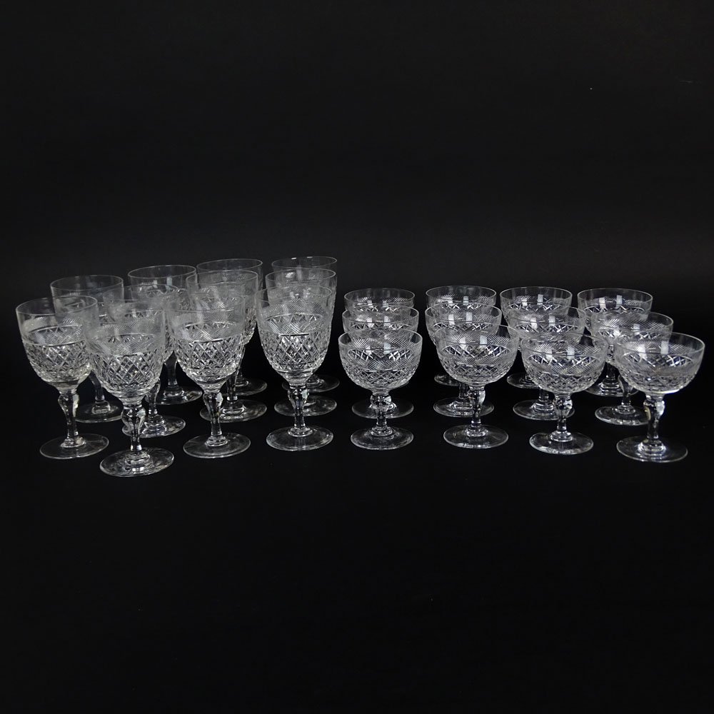 Twenty Three (23) Piece Thomas Webb Crystal Stemware in: Twenty Three (23) Piece Thomas Webb Crystal Stemware in the Heirloom-Tudor Holbein Pattern Including Eleven (11) Wine Stems and Twelve (12) Champagne Coupes. Etched signature to base. Good condition.