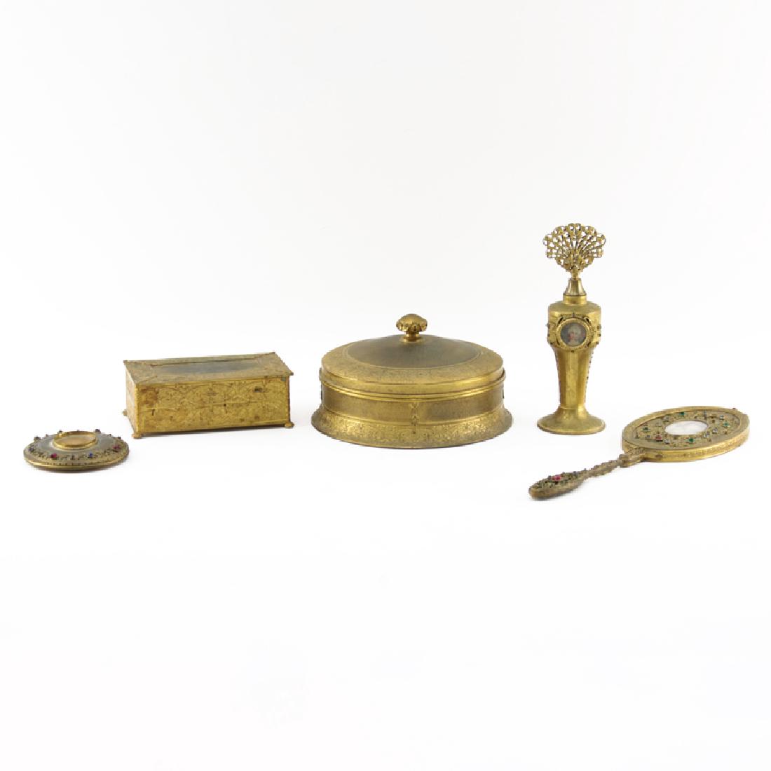 Five (5) Pc Apollo Studios New York Gilt Brass Dresser: Five (5) Pc Apollo Studios New York Gilt Brass Dresser Set. Includes: jeweled mirror with portrait (13" L), perfume bottle with portrait (8-1/4" H), round divided insert glass dresser box (5" H x 7-1/