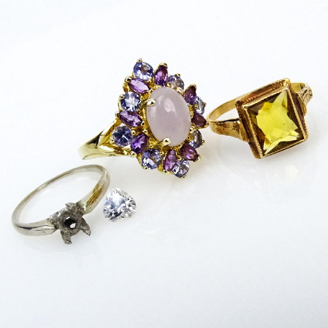 Grouping of Three (3) 14 Karat Gold Rings. Two accented (1 of 1)