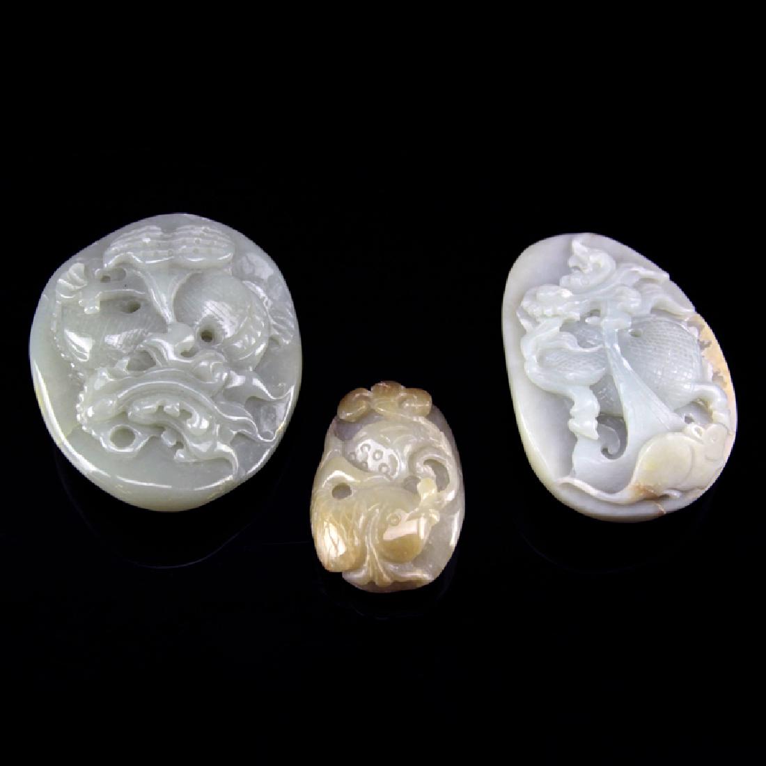 Three (3) Vintage Chinese Carved Jade Pebble Pendants. (1 of 2)