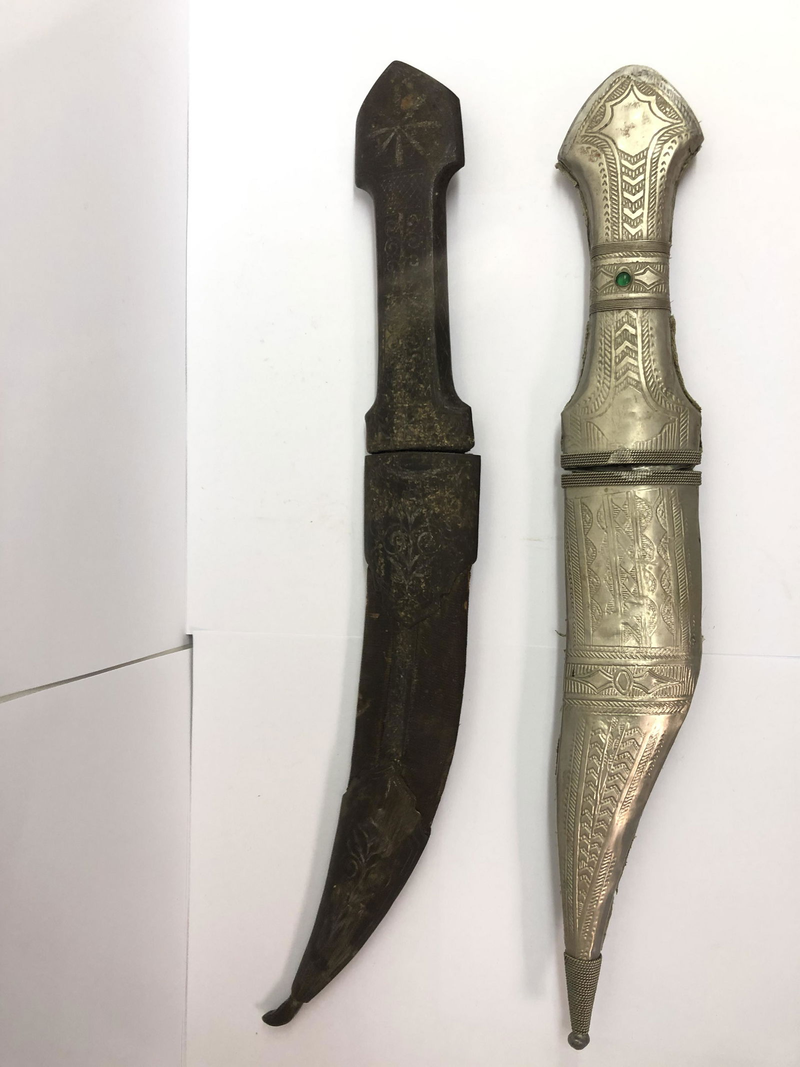 2 Middle Eastern Daggers w/ Sheaths - Etched Silver: 2 Middle Eastern Daggers w/ Sheaths - Etched Silver Handle w/ Sheath, Blade 6.5'' Long, w/ Sheath 12'' Long + Antique Etched Blade w/ Metal / Etched Wood Sheath, Blade 6.75'' Long, Overall 14'' Long