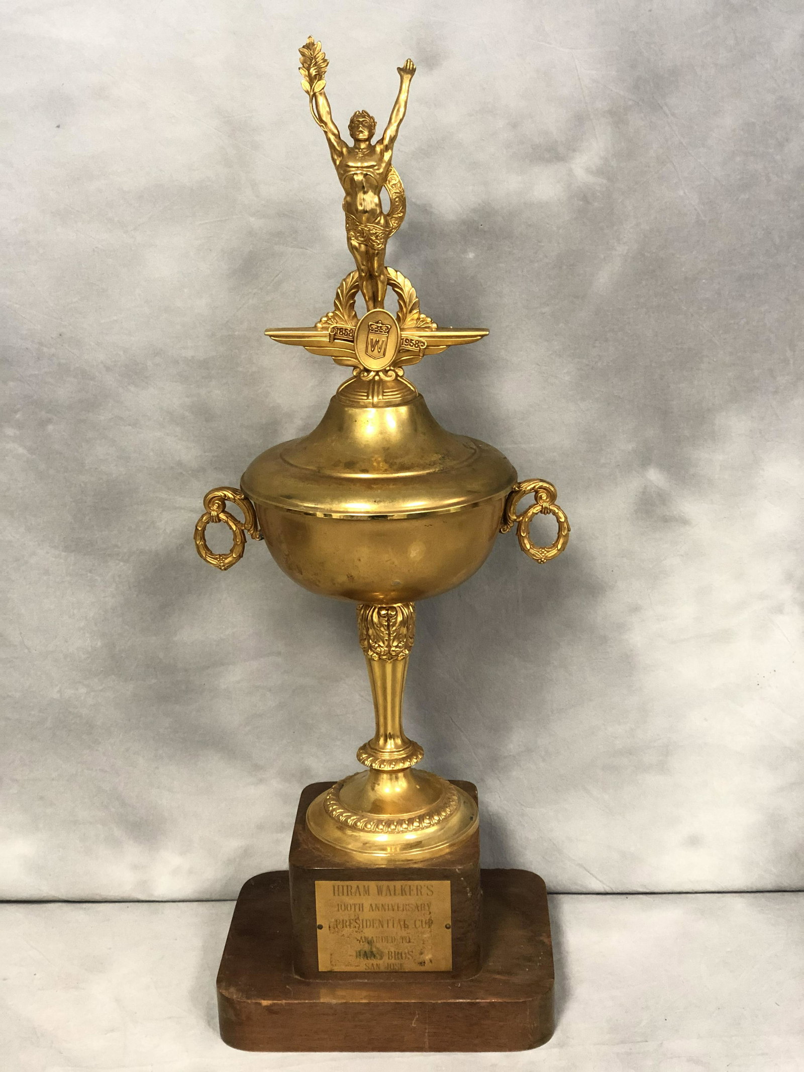 Hiram Walkers 100th Anniversary Trophy - 1858-1958: Hiram Walkers 100th Anniversary Trophy - 1858-1958 Presidential Cup Trophy, Wooden Base, 29'' Tall x 10'' Across x 7.75'' Wide